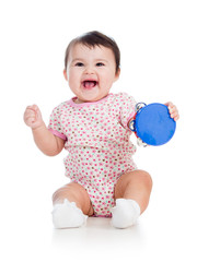 Baby girl playing musical toy