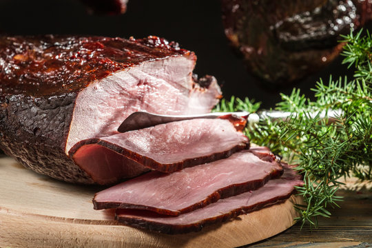 Closeup of a sliced piece ​​smoked ham
