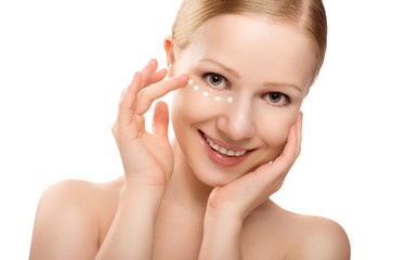 skin care. face of beautiful healthy woman with cream isolated