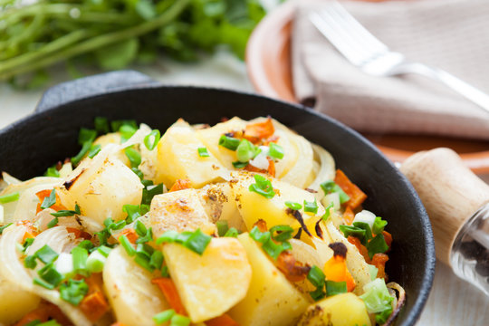 roasted potatoes in a large pan