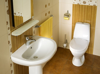 Interior of modern bathroom with sink and toilet