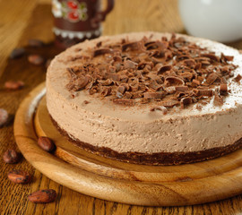 Cold chocolate cheesecake on brown table