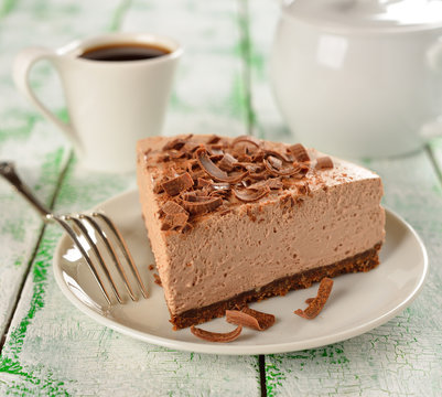 Cold chocolate cheesecake on a white plate