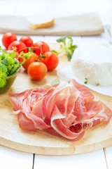 Close-up of italian food-prosciutto crudo and ricotta