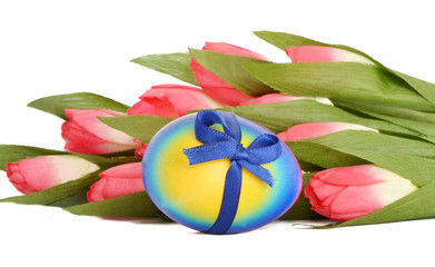 Easteregg with blue ribbon and flowers