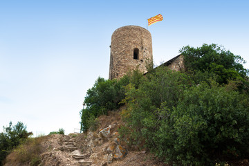 St. John Castle Tower with the catalonian flag at the top, Spain