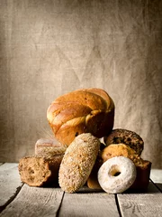 Fotobehang Bread on the old table © Givaga