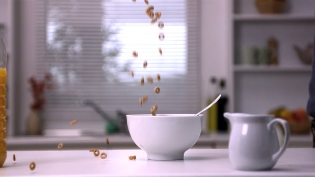 Cereal falling in a bowl