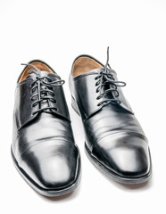 The black man's shoes isolated on white background.