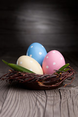 Colorful easter eggs in a nest