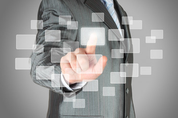 Businessman with hand using virtual inteface