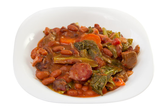 sausages with carrot, beans and cabbage on the plate