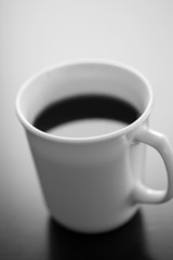 Single cup of black coffee