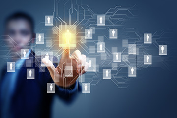 Image of male touching icon of social network