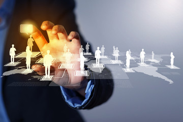 Image of male touching icon of social network