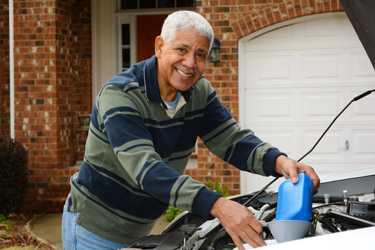 Mechanic Working On Car