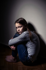 Portrait of a sad little girl
