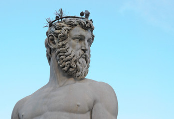 head and torso of statue of neptune firenze italy