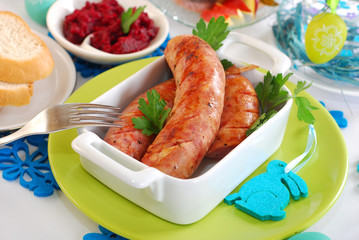 grilled white sausage with beetroot sauce for easter