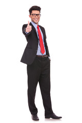 business man shows thumbs up