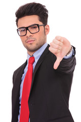 business man showing thumb down