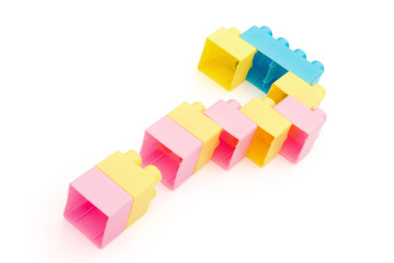 Fototapeta premium toy bricks shaped like a question mark with clipping path