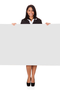 Happy Businesswoman Holding Placard