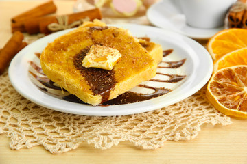 White bread toast with chocolate and cup of coffee in cafe