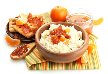 cottage cheese in bowl with homemade tangerine jam, isolated