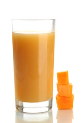 Glass of tasty pumpkin juice and pumpkin, isolated on white