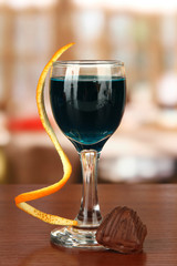 Tasty color liquor, on bright background