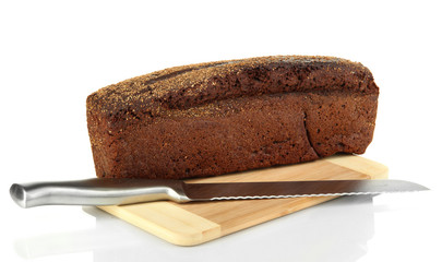 Black bread with sesame seeds and knife
