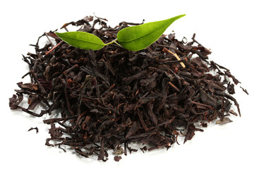 Dry black tea with green leaves, isolated on white