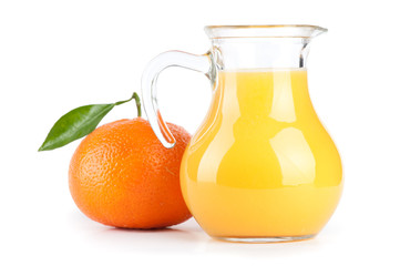 Orange juice in pitcher. Isolated on white background