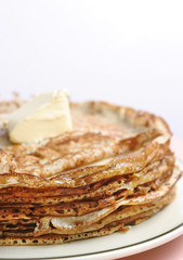 Stack of pancakes with butter