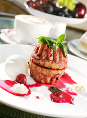 Cake with ice cream, outdoor cafe
