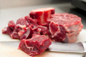 red beef and metalic knife