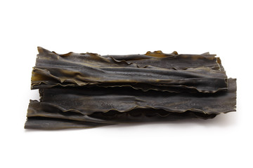 Kombu, sea vegetable on white background