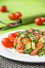 Salad with avocado and red fish