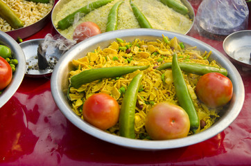 indian food in plate and frankincence in market