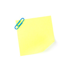 Neon yellow paper note with a blue clip