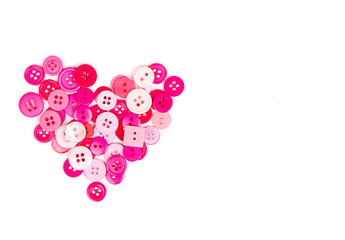 Pink buttons in shape of heart
