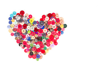 Assorted buttons in shape of heart