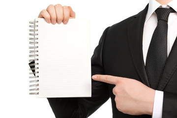 Isolated businessman in a suit and tie, holding a notebook