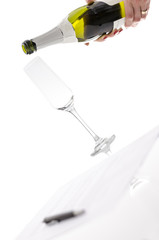 Woman about to pour wine into a glass