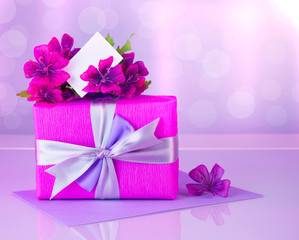 Pink gift box with greeting card