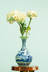 Flower vase on a wooden table