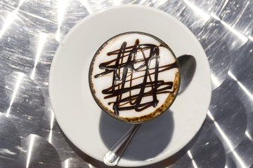 caffè decorato con cioccolato