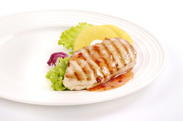 Grilled chicken steak with pineapples