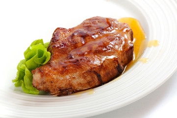 Grilled pork steak with honey